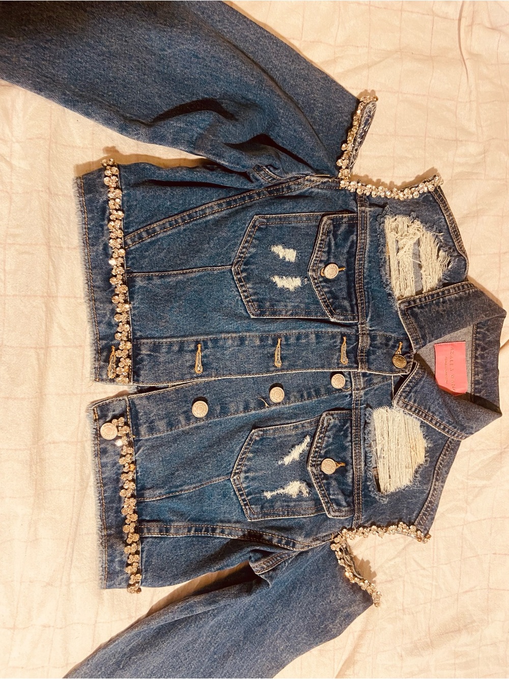 Distressed Open Shoulder Denim Jacket with Crystal Trim